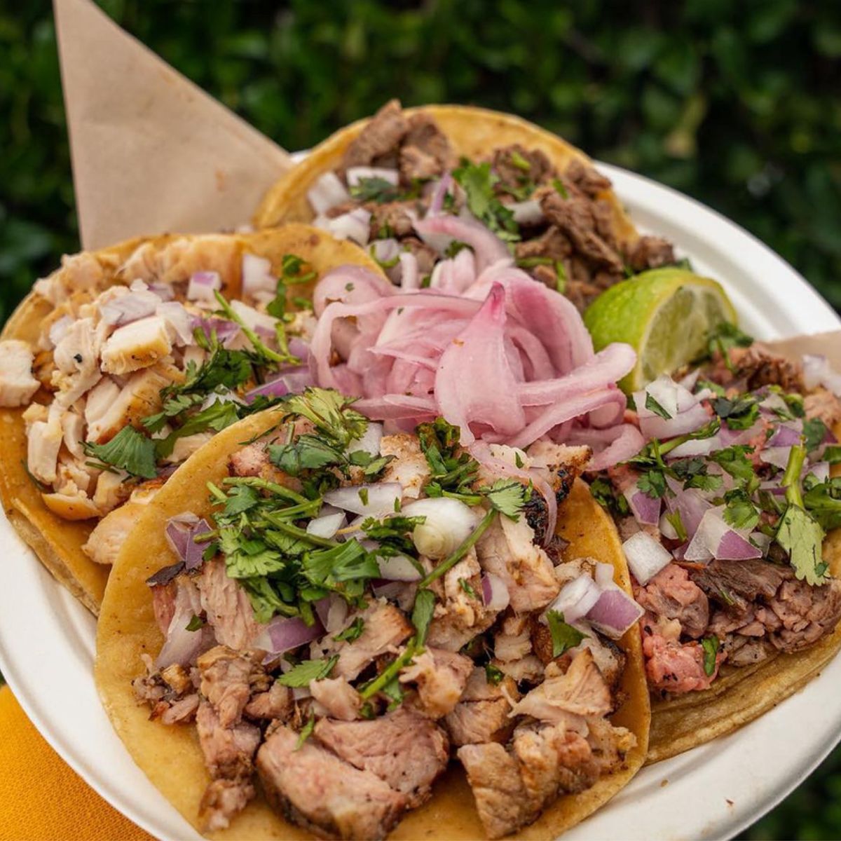Tacos El Gringo street tacos with pickled onion, cilantro and lime